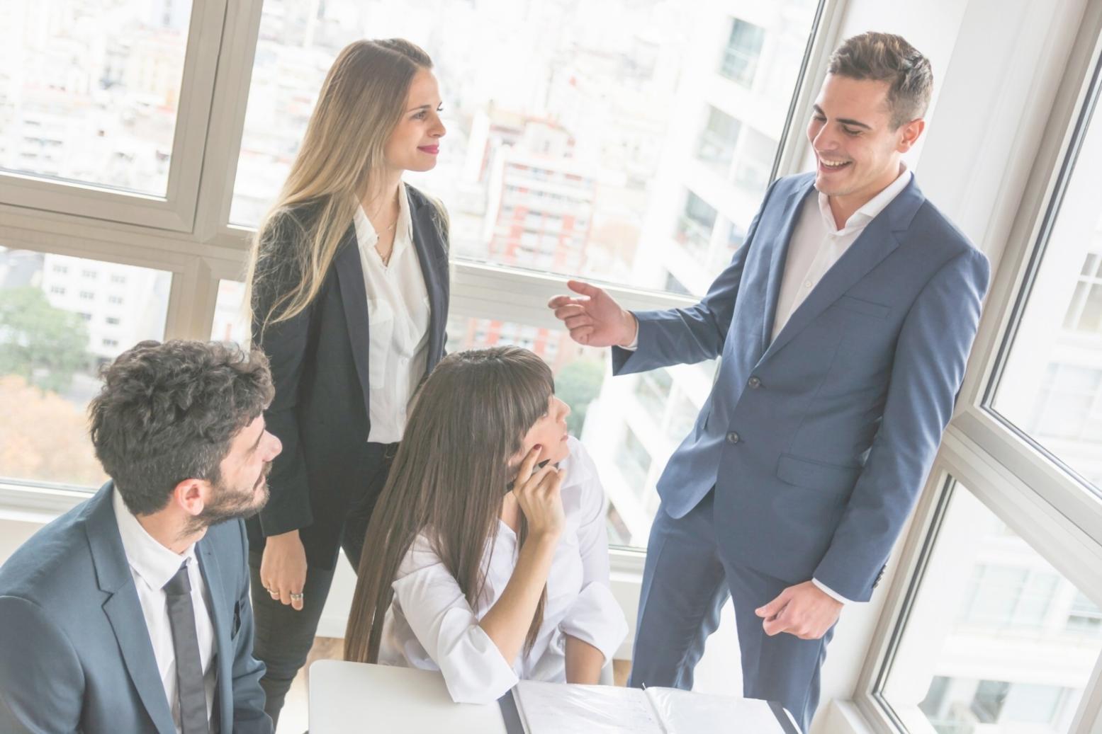 Professional presenting financial modeling results to team